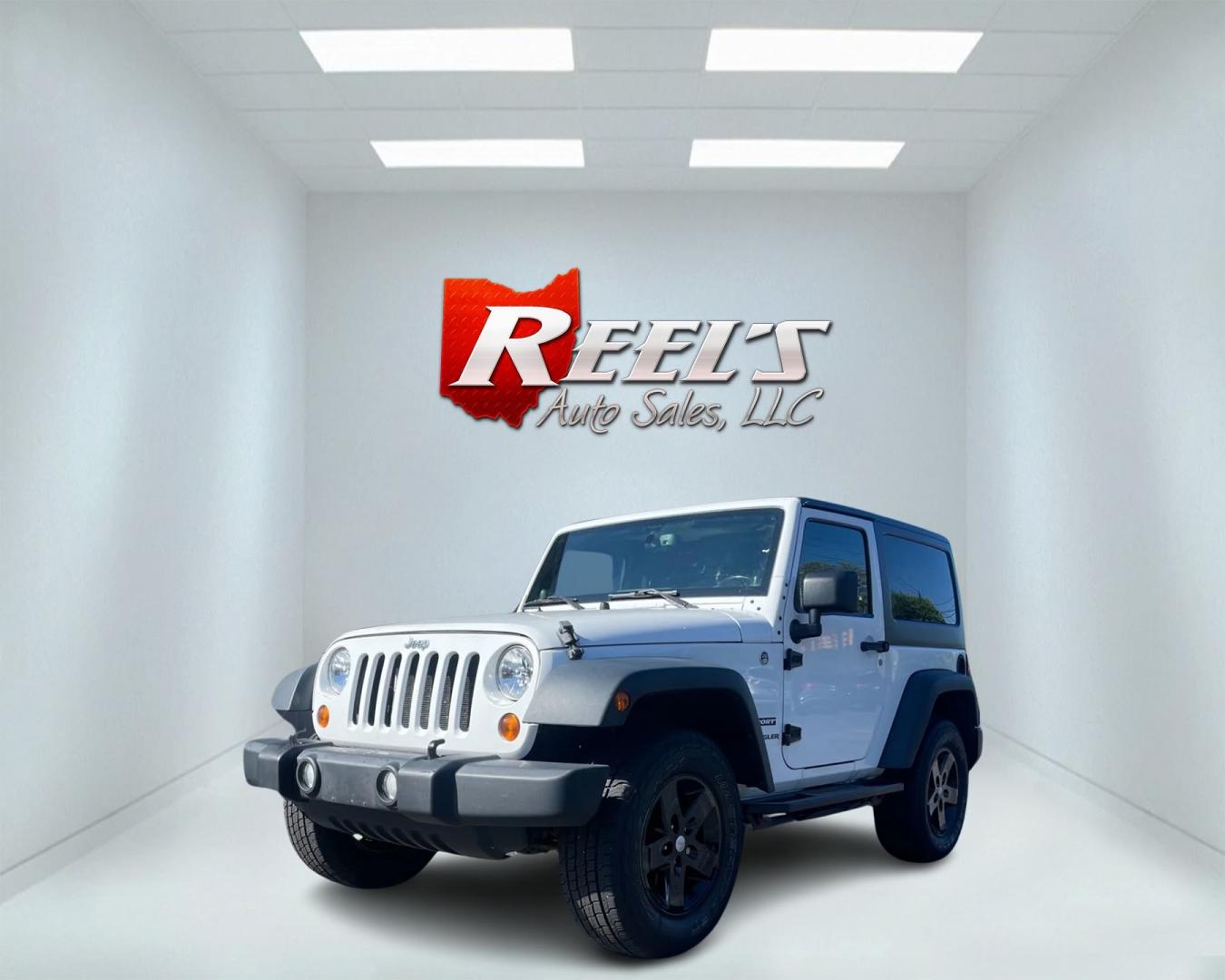 2013 White /Black Jeep Wrangler Sport 4WD (1C4AJWAG7DL) with an 3.6L V6 DOHC 24V engine, 6 Speed Manual transmission, located at 11115 Chardon Rd. , Chardon, OH, 44024, (440) 214-9705, 41.580246, -81.241943 - Photo#0